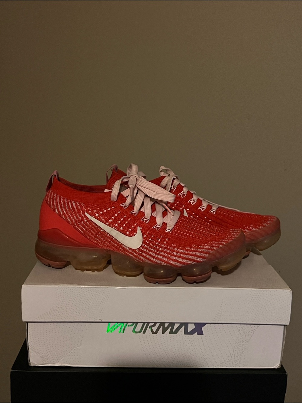 Nike Women’s Red Vapormax Flyknit Sneakers with White Swoosh